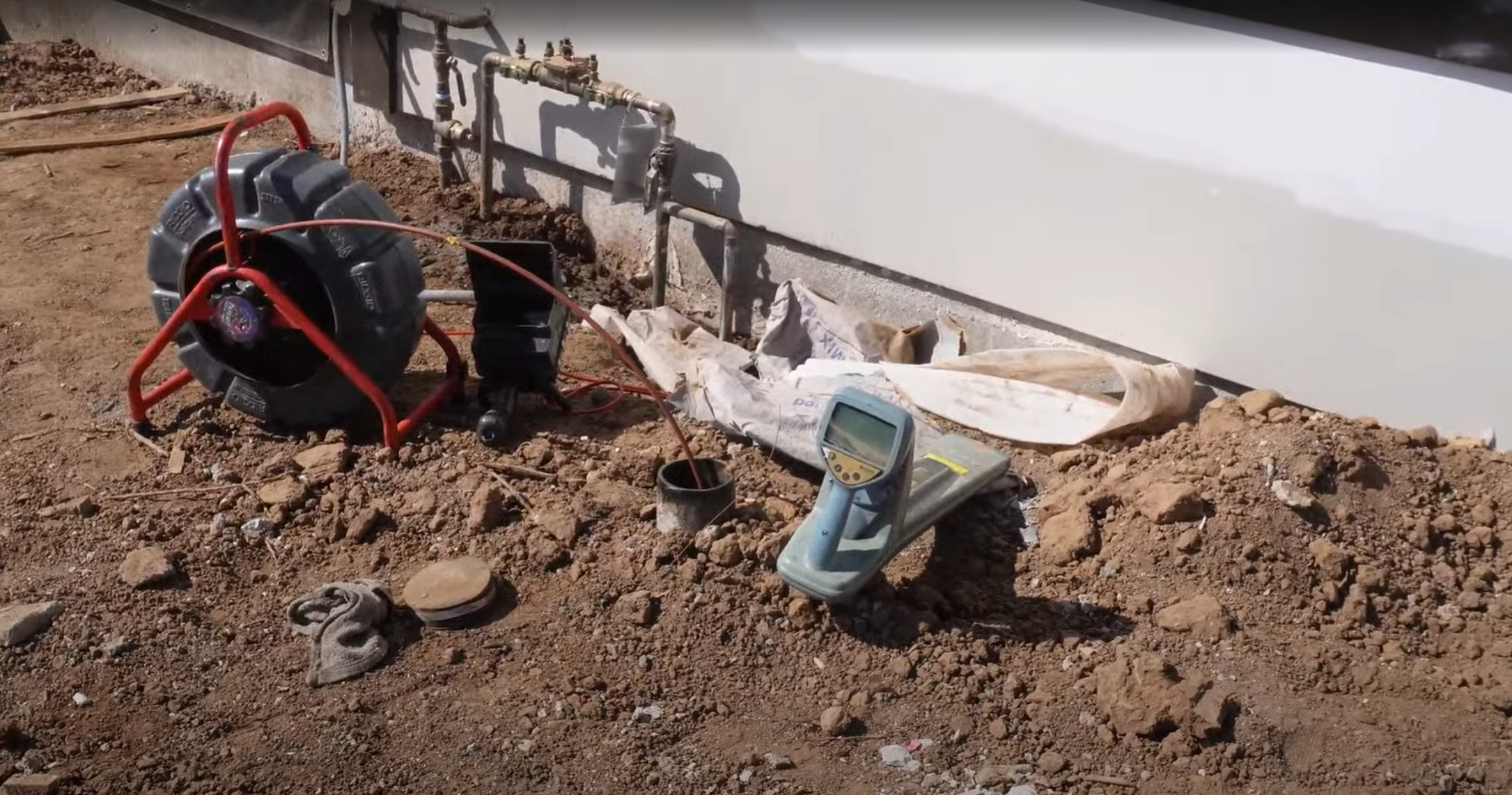 Sewer camera inspection equipment at a fire-damaged Pacific Palisades property